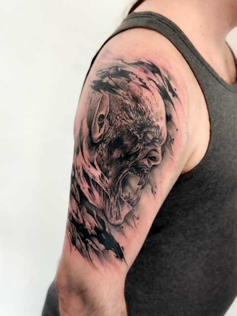 Mustaharmaa tatuointi Tuusula